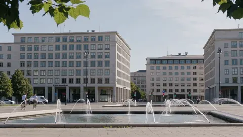 5-second cinematic architectural shot. Very slow stabilized…