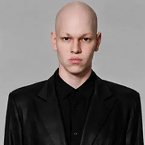 Edit @image1, this exact photo. It is the same young man as…
